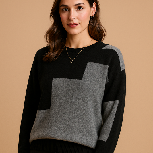 Luźny sweter damski o eleganckim kroju i minimalistycznym designie